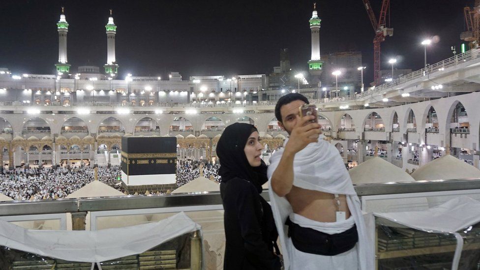 Muslim pilgrims take a selfie inside Mecca's Grand Mosque at the start of the Hajj (30 August 2017)