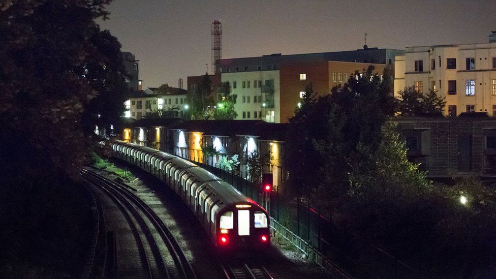 Tube train at night