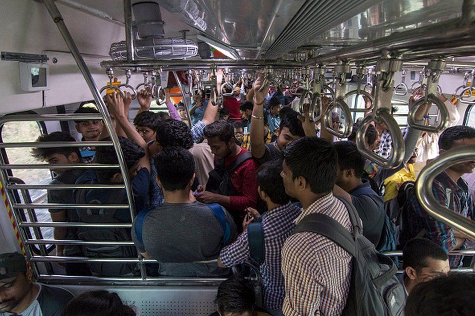 People travel in Central Railway's first air-conditioned EMU local train, on January 30, 2020, in Mumbai, India.