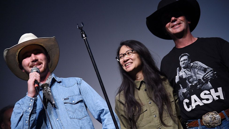 Zhao with Brady and Tim Jandreau, who starred in her 2017 film The Rider