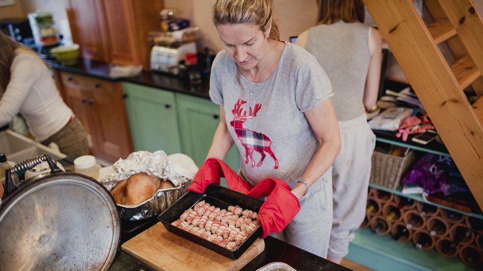 Woman preparing Christmas dinner