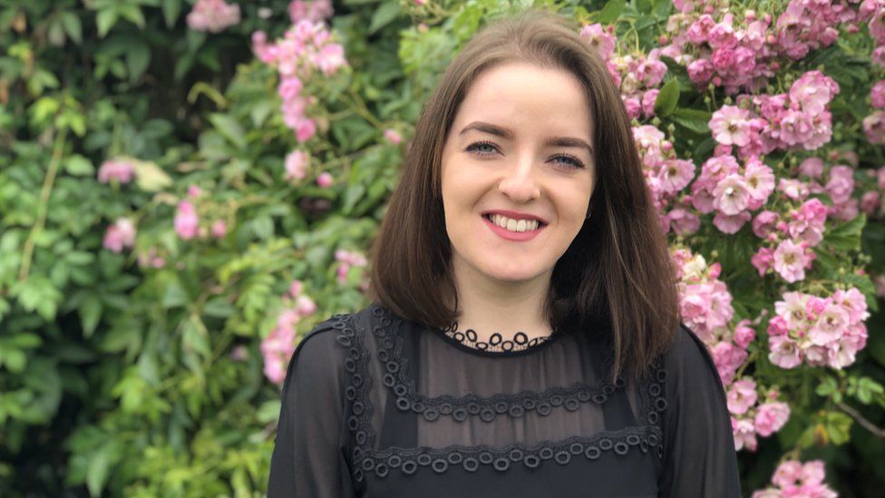 Olivia Hughes is writing her dissertation on the emotional impact of her psoriasis