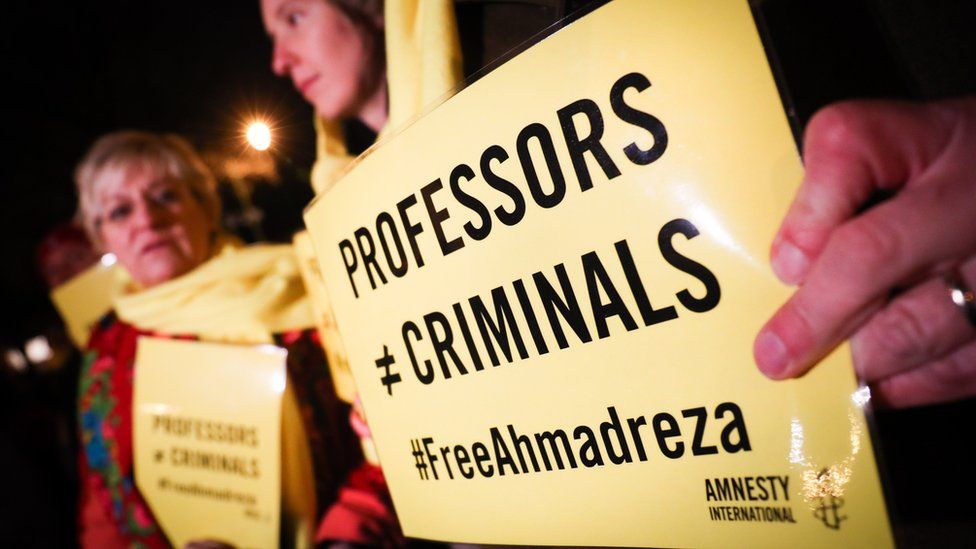 People take part in a rally on 14 December 2017 at the Iranian embassy in Brussels, in support of Ahmadreza Djalali after Iran's Supreme Court upheld the death sentence handed to him, an Iranian-born Swedish resident and specialist in emergency medicine