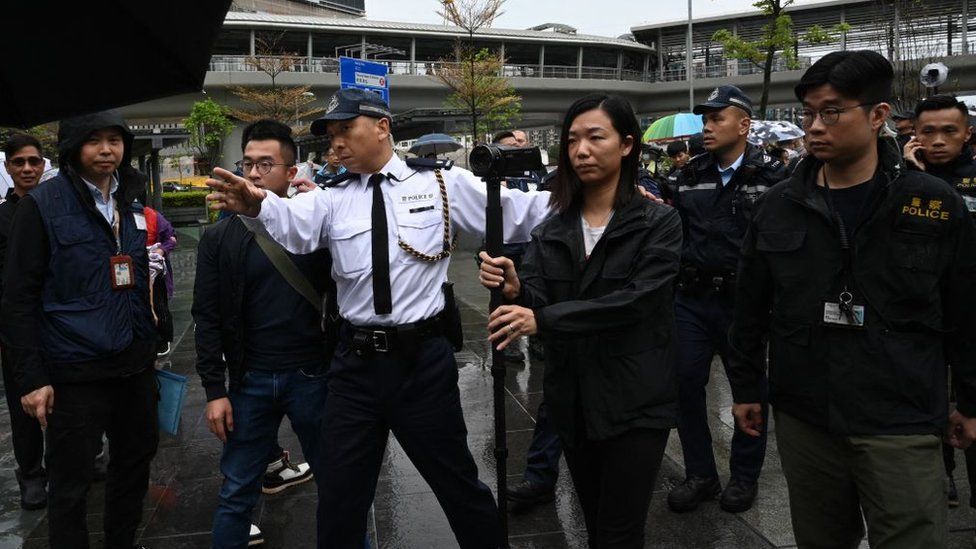 Police monitor first Hong Kong protest since 2020 - BBC News