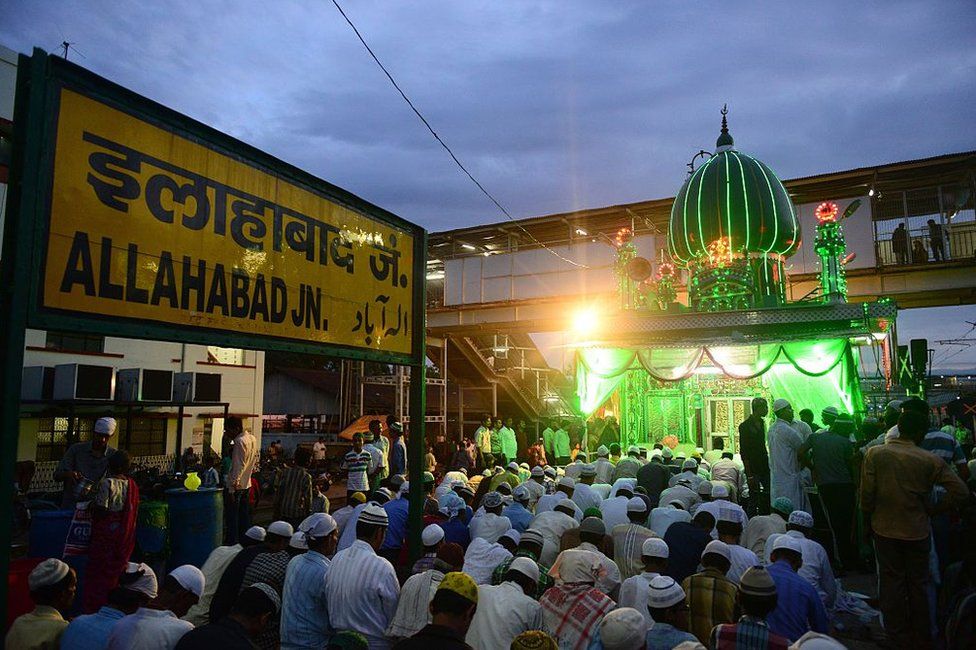 Indian Muslim devotees offer prayers after breaking their fast outside the Line Shah Baba Mosque in Allahabad.
