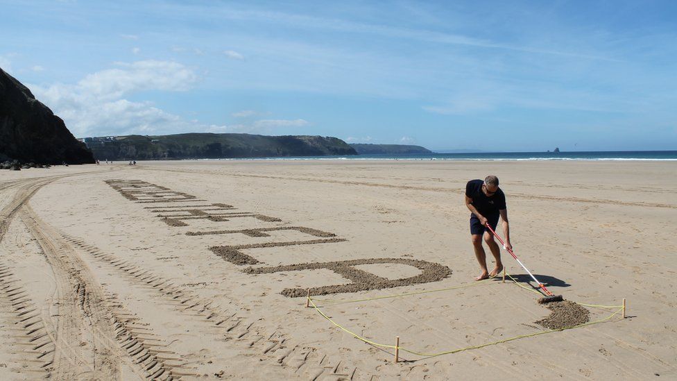 beach sand writing