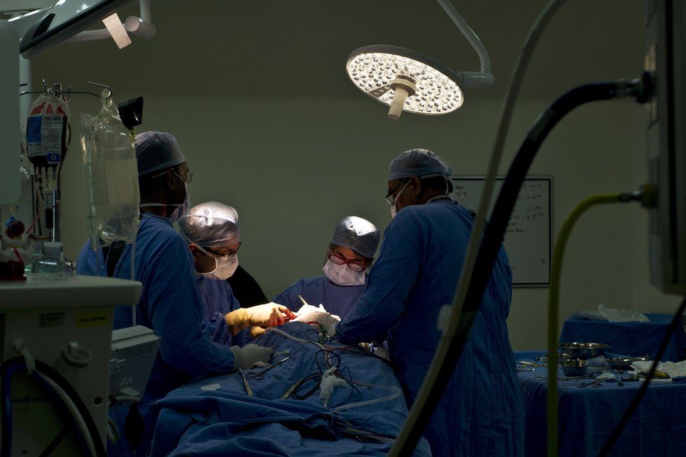 Representational photo of doctors performing a surgery