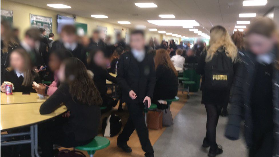 pupils close to each other inside school