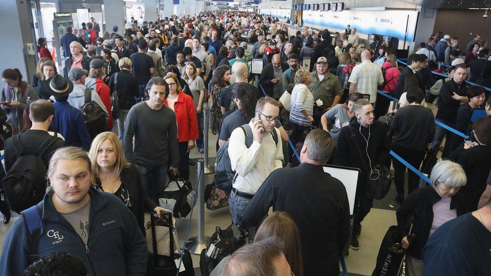 Why are airport security queues so long in the US lately? BBC News