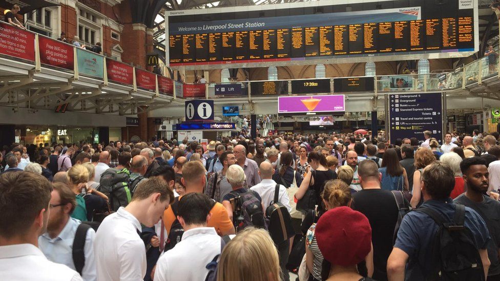 Rail travellers at Liverpool Street Station