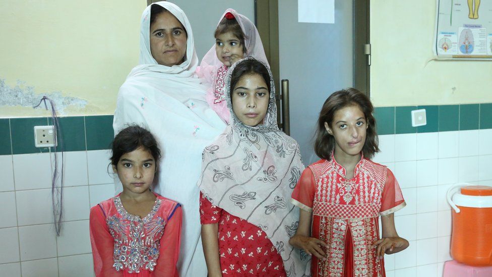 Rubina with her four daughters at Mansehra clinic