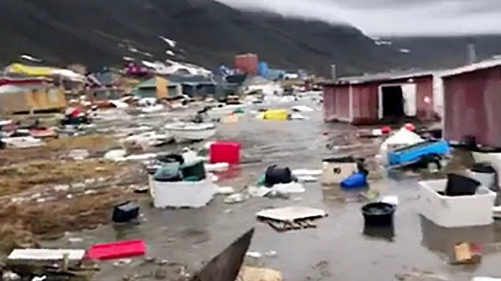 Houses close to Nuugaatsiag, Greenland, flooded by tidal waves on 18 June, 2017.