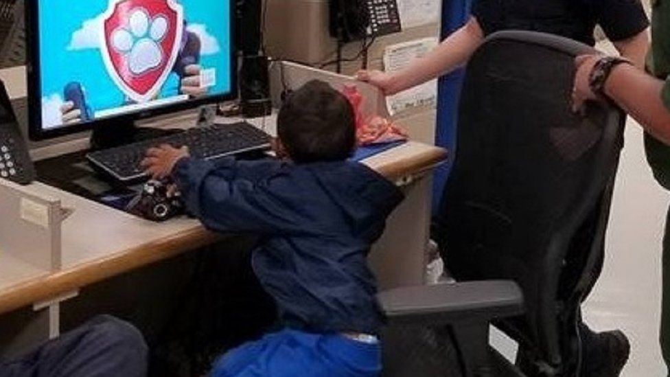 Migrant boy at border station