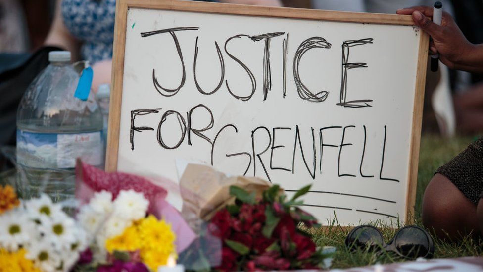 A sign reading "Justice for Grenfell" displayed during a vigil at Parliament Square on 19 June, 2017