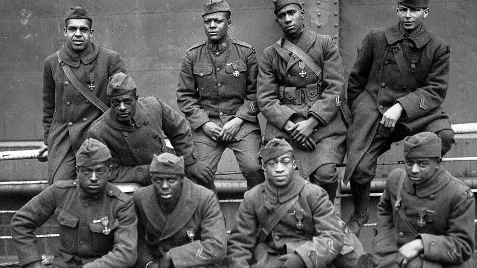 These WWI soldiers returned to France in 191 to receive the Croix de Guerre medal