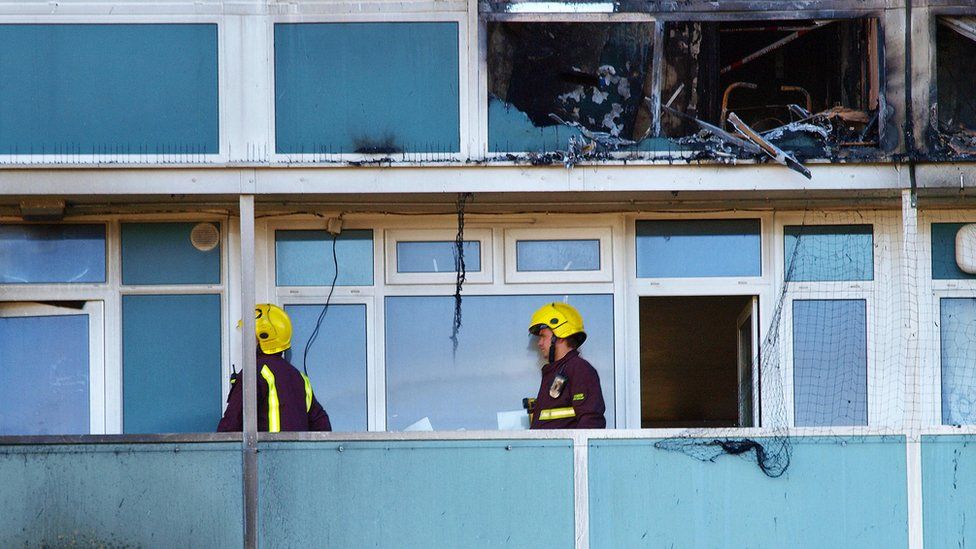 Firemen at Lakanal House after the fire in 2009