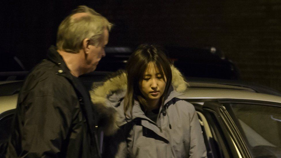 South Korea's Chung Yoo-ra, the daughter of Choi Soon-sil, the confidante of disgraced President Park Geun-hye, in custody after her court hearing Monday, Jan. 2, 2017, in Aalborg, Denmark
