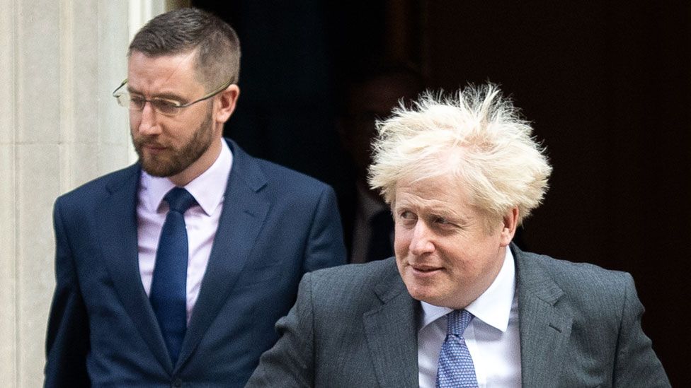 Cabinet Secretary Simon Case and British Prime Minister Boris Johnson walk from Downing Street on 15 September 2020 in London, England