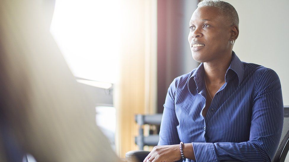 Woman chatting with a doctor