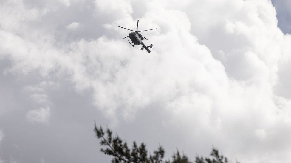 Police helicopter over Dilserbos in Dilsen-Stokkem, Wednesday 19 May 2021