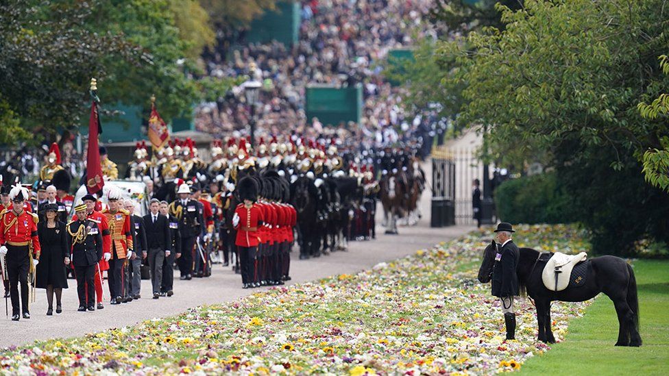 Emma, the monarch's fell pony, stands as the Ceremonial Procession of the coffin of Queen Elizabeth II arrives at Windsor Castle