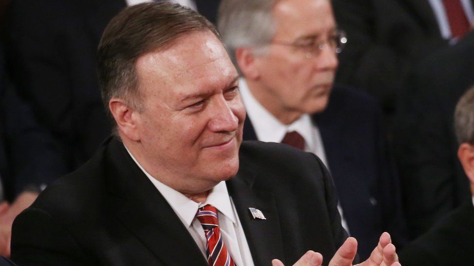 Secretary of State Mike Pompeo applauds during the State of the Union address in February 2020