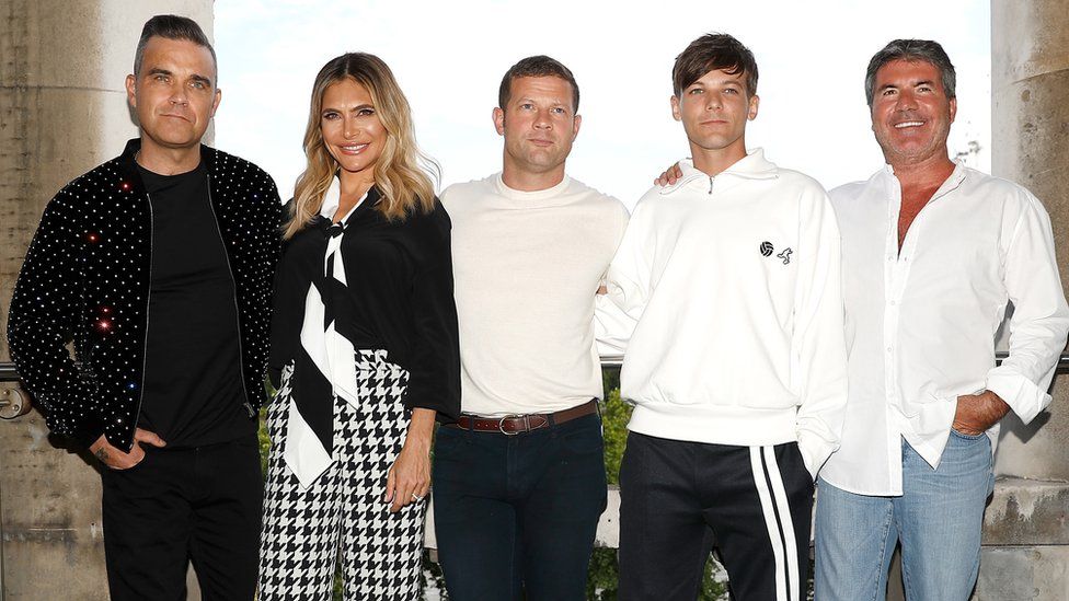 L to R: Robbie Williams, Ayda Field, Dermot O'Leary, Louis Tomlinson and Simon Cowell