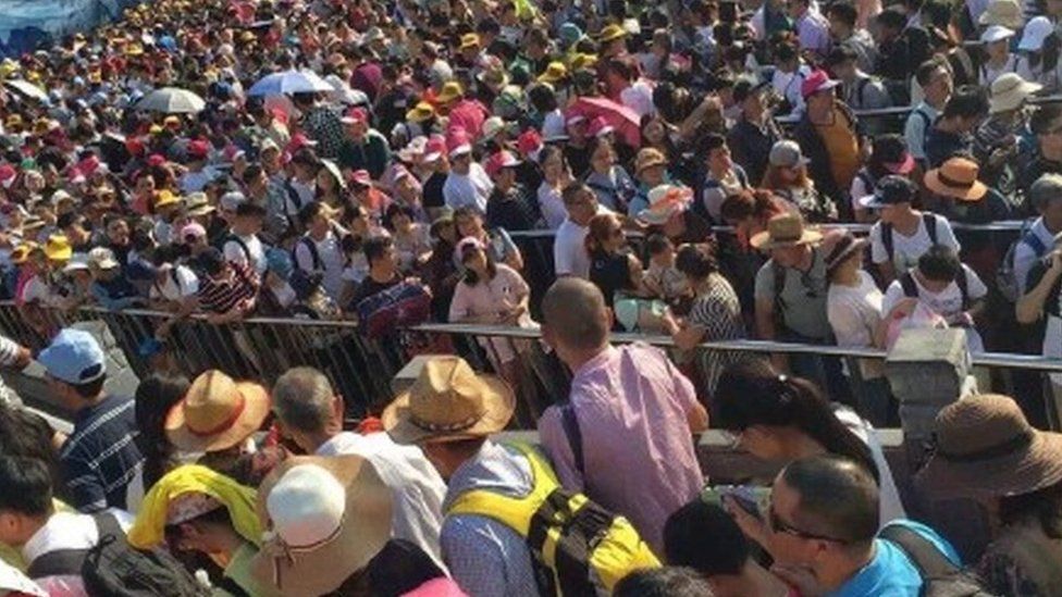 People queue to get into the Yellow Mountain