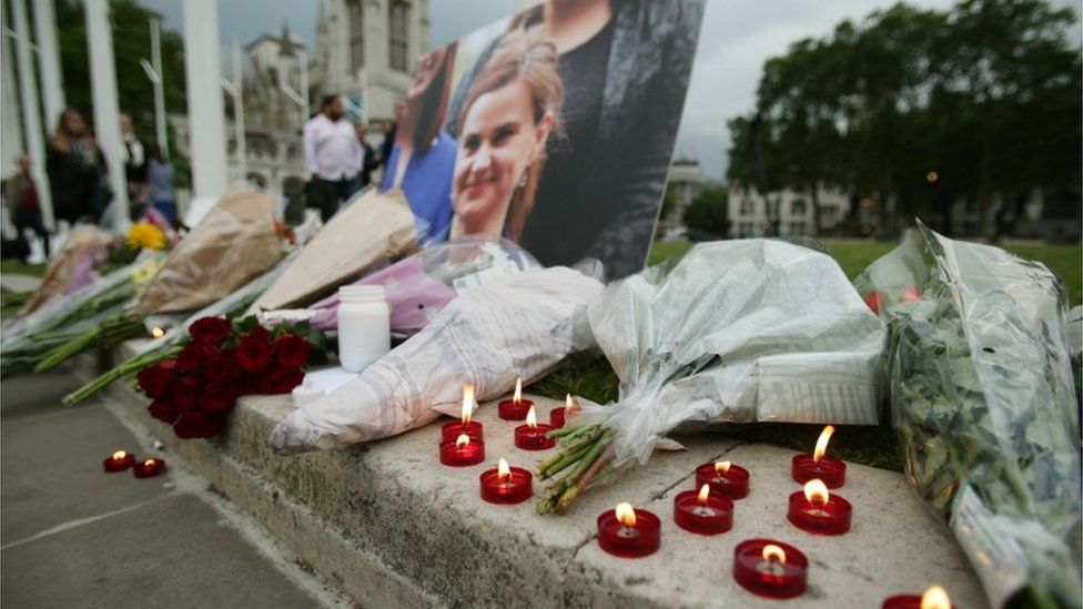 Flowers and candles laid in tribute to Jo Cox