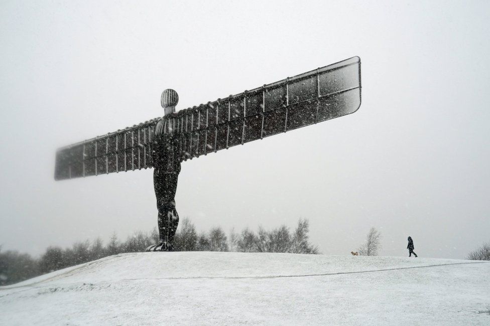 The Angel of the North sculpture covered in snow