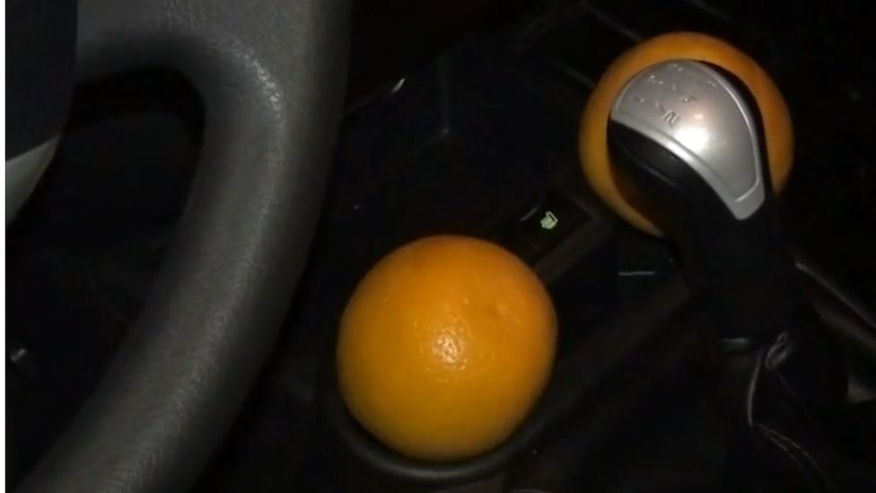 Oranges inside robbery suspect's car