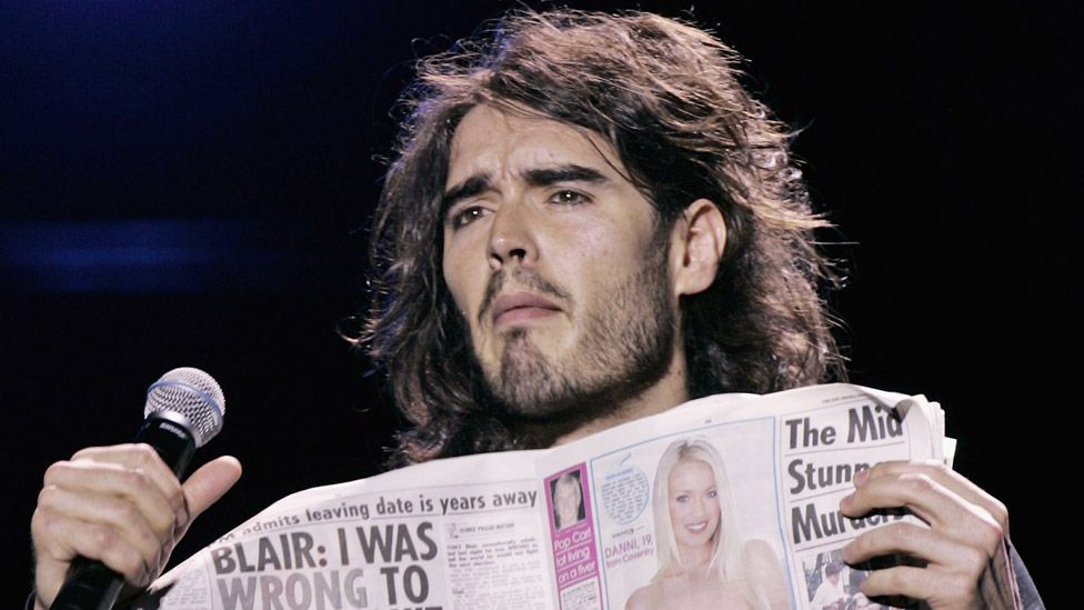 Comedian Russell Brand performs on stage on the first night of a series of concerts and events in aid of Teenage Cancer Trust organised by charity Patron Roger Daltrey, at the Royal Albert Hall on March 27, 2006 in London