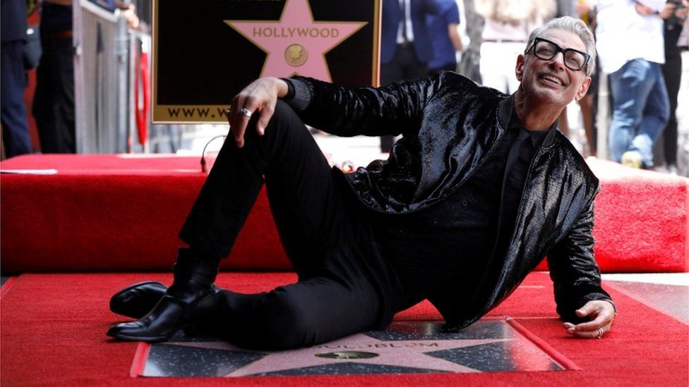 Jeff Goldblum poses on his new Walk of Fame star
