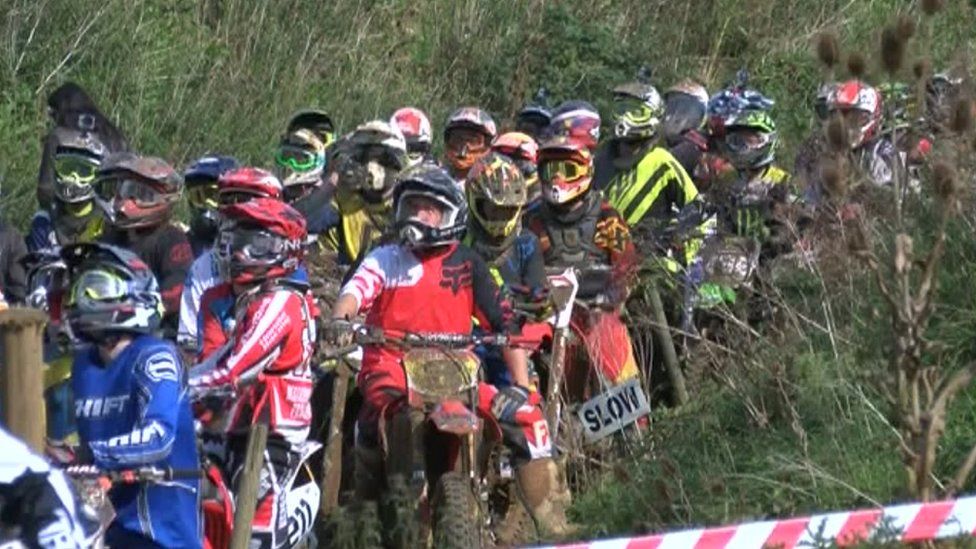 Line-up of motocross bikes