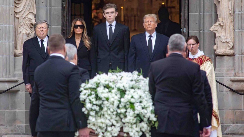 Viktor Knavs, Melania Trump, Barron Trump, and Donald Trump at the funeral in Florida