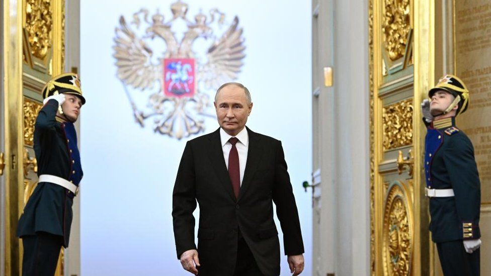 Russian President Vladimir Putin walks before his inauguration ceremony at the Kremlin in Moscow, Russia May 7, 2024