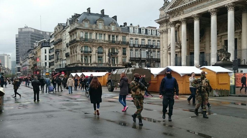 Armed police and soldiers on patrol in Brussels, Belgium