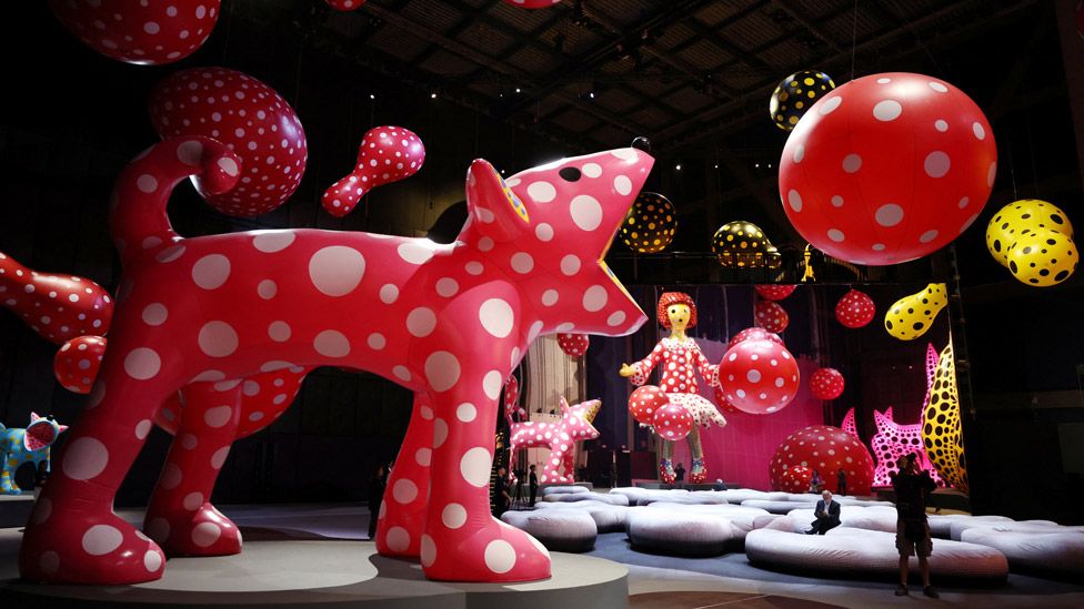 Yayoi Kusama inflatable polka . sculptures at Aviva Studios in Manchester