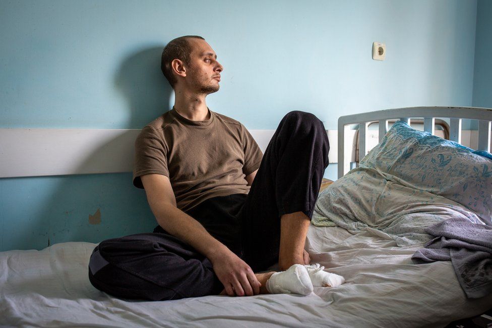 Nikita Horban sits in a medical facility in Zaporizhzhya. "It still hurts," he said. "The wounds are still fresh."