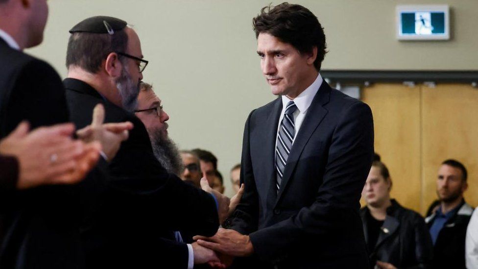 Canada's Prime Minister Justin Trudeau shakes hand with people attending a pro-Israel rally at the Soloway Jewish Community Centre in Ottawa, Ontario, Canada October 9, 2023.