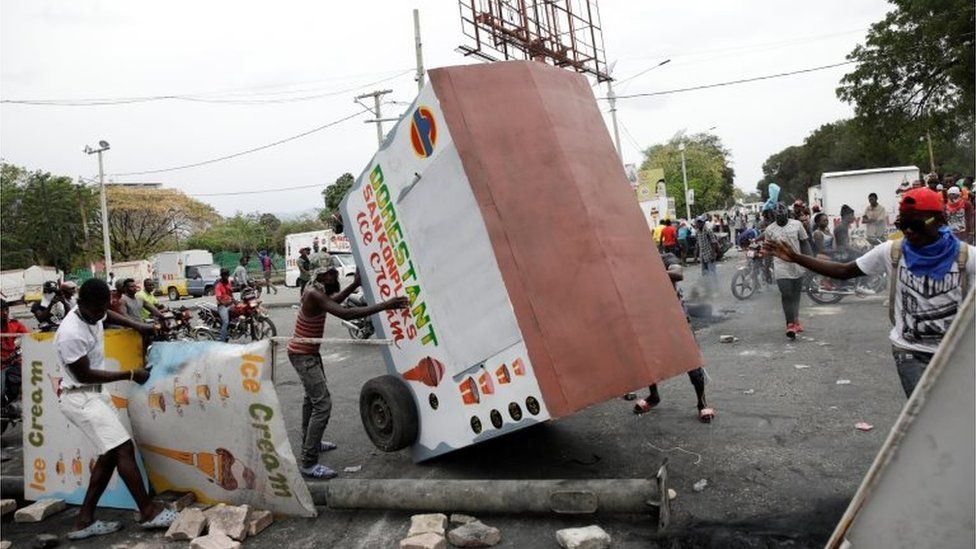 Demonstrators build barricades during a protest in Port-au-Prince, Haiti February 24, 2020.