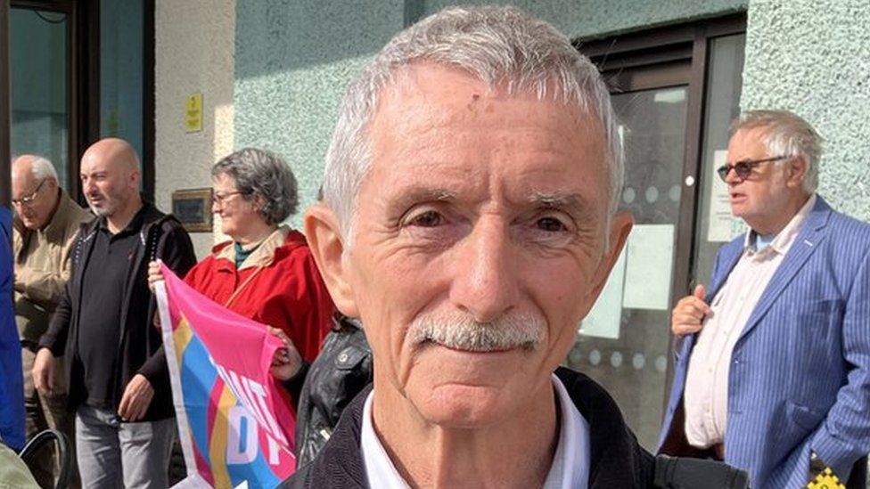 Toni Schiavone with protestors outside the Aberystwyth Justice centre