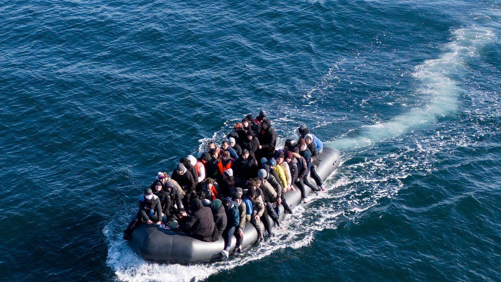 Migrants crossing English Channel on small boat