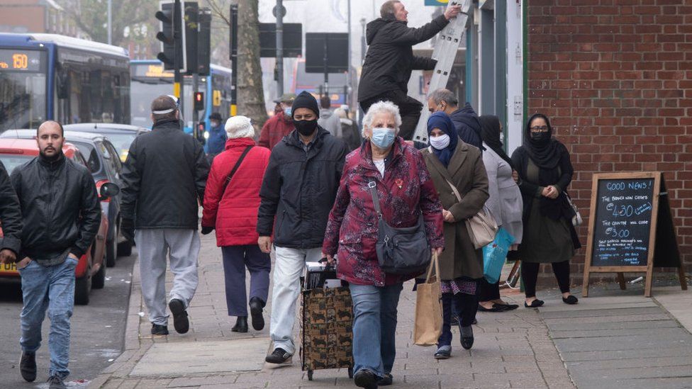 People walking along a Birmingham street