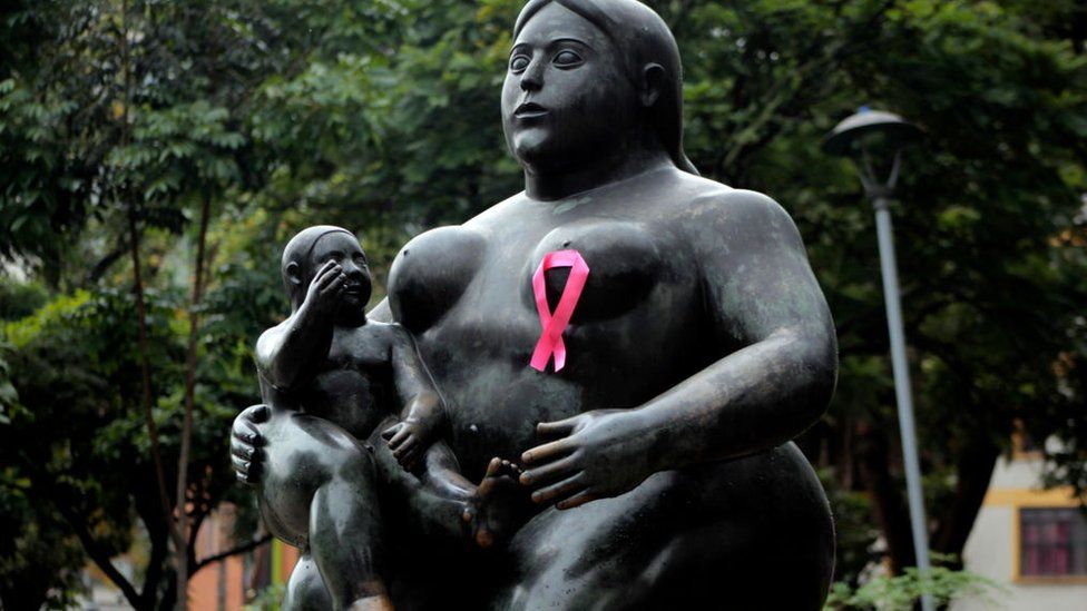 Botero statue wearing a pink bow as part of a breast cancer awareness campaign in Colombia, 2020