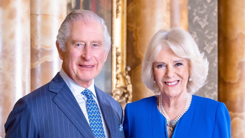 The King and Camilla smile in new portraits released ahead of the Coronation