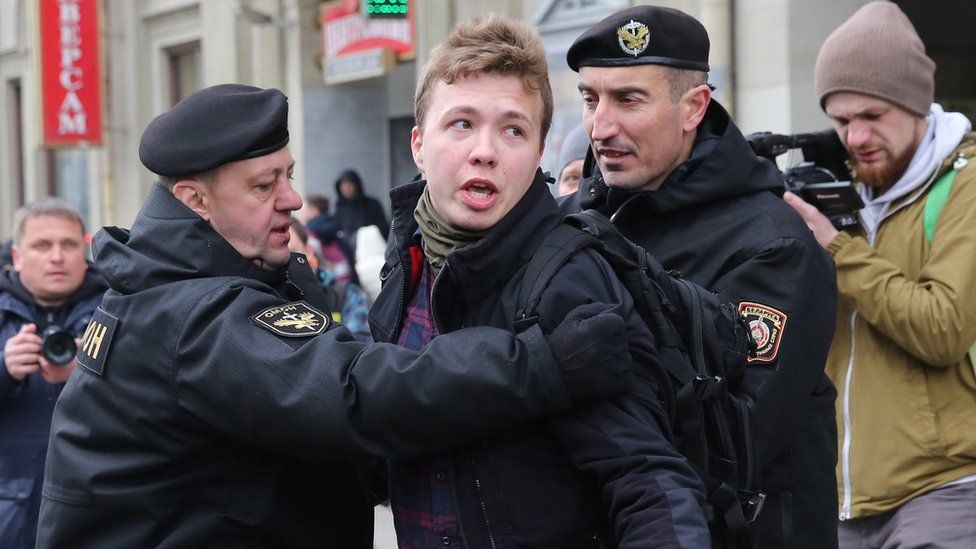 Police officers detain a journalist Roman Protasevich attempting to cover a rally in Minsk, Belarus, 26 March 2017