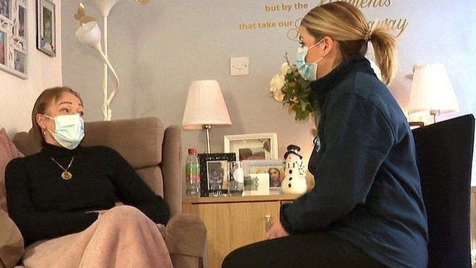 Community nurse specialist Paula McLaren visits the home of Rosanne Verhees