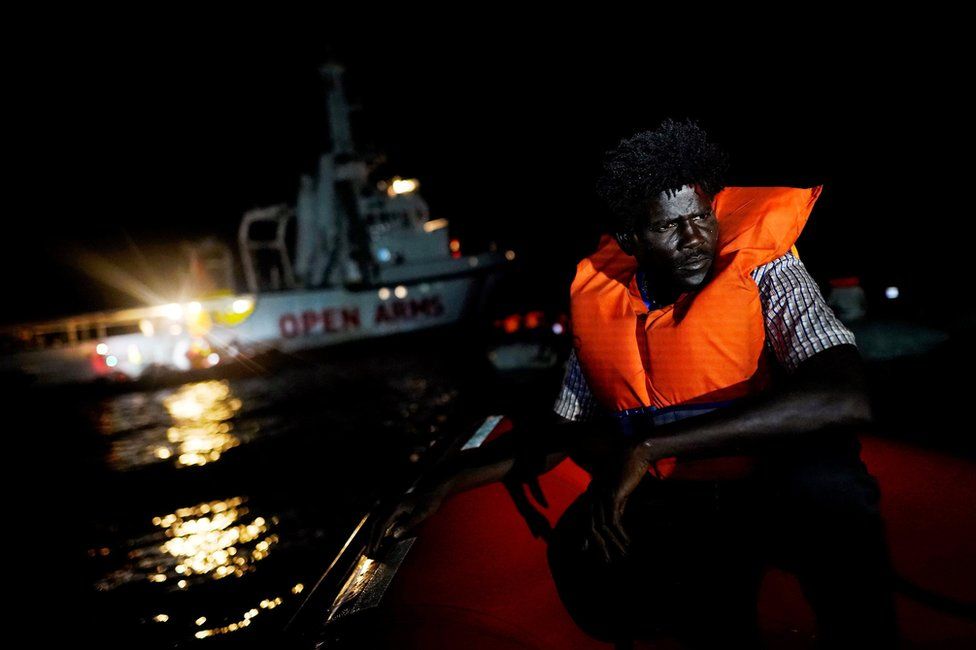 Ahmed, 38, from Sudan, sits on board the NGO Proactiva Open Arms rescue boat in the central Mediterranean Sea