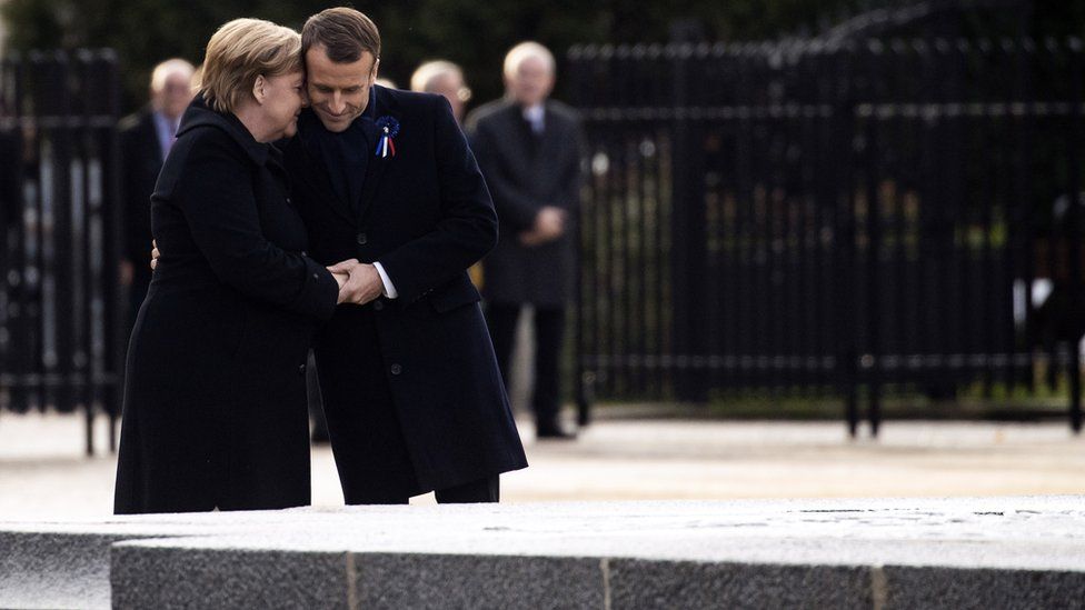 French President Emmanuel Macron and German Chancellor Angela Merkel attend a ceremony at the glaze of the Forest of Rethondes in Compiegne, France, 10 November 2018